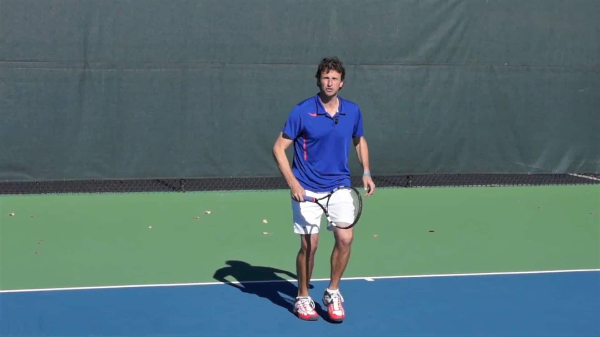 Jeff Salzenstein demonstrating incorrect serve and volley technique with short, tall steps.